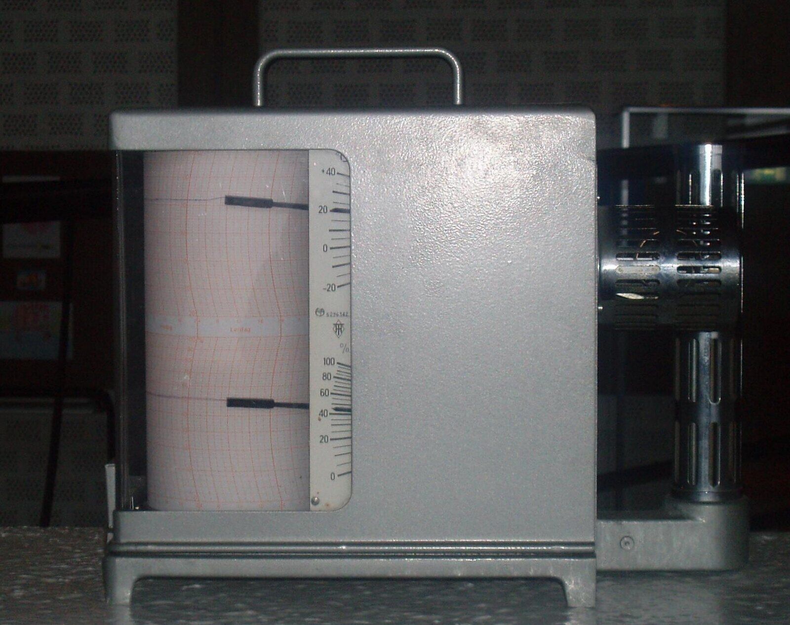A real hygrometer and thermometer used to record humidity and temperature