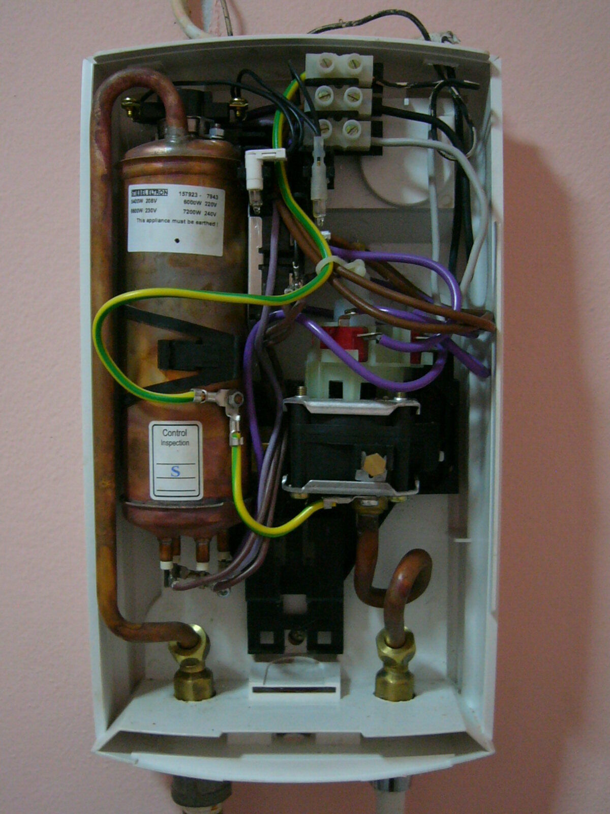 A real wall-mounted electric tankless water heater