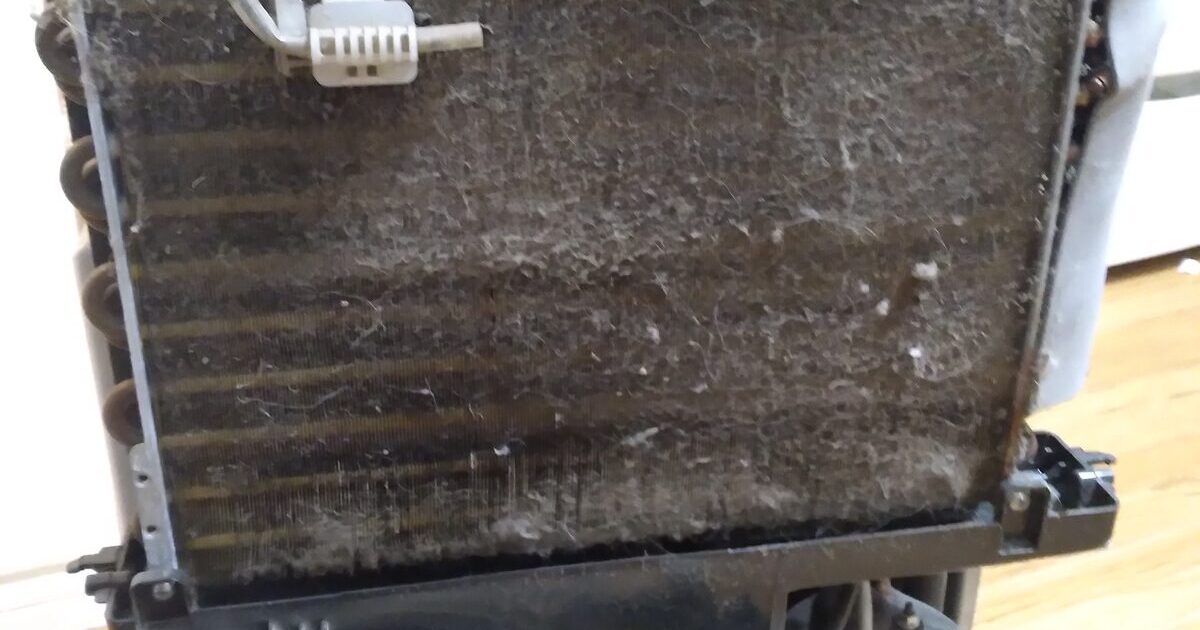 Dirty air-conditioner filters showing accumulated dust