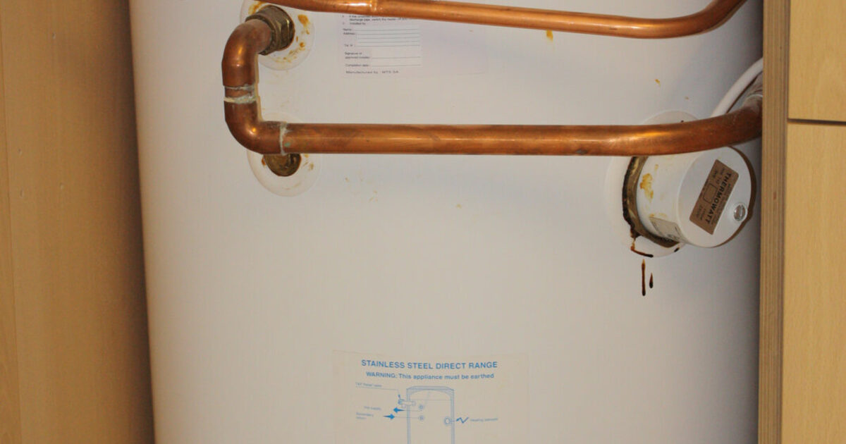 A real electric hot-water storage tank installed in a utility space