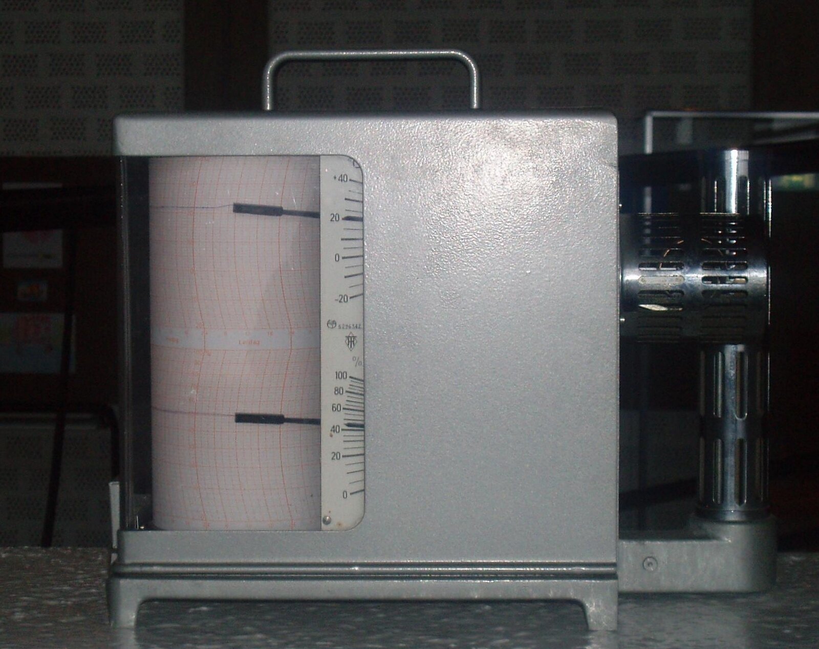 A real hygrometer and thermometer used to record humidity and temperature