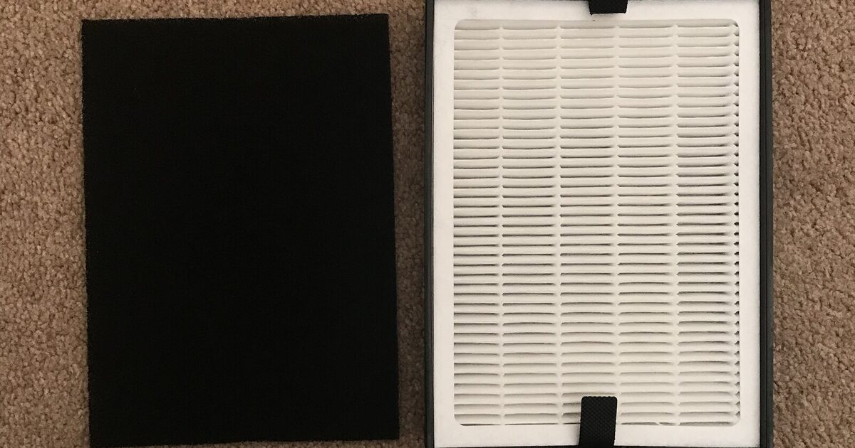 A real rectangular HEPA filter beside a real activated-carbon filter