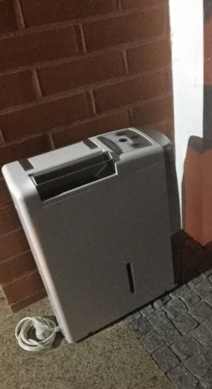 A real portable dehumidifier viewed from the front