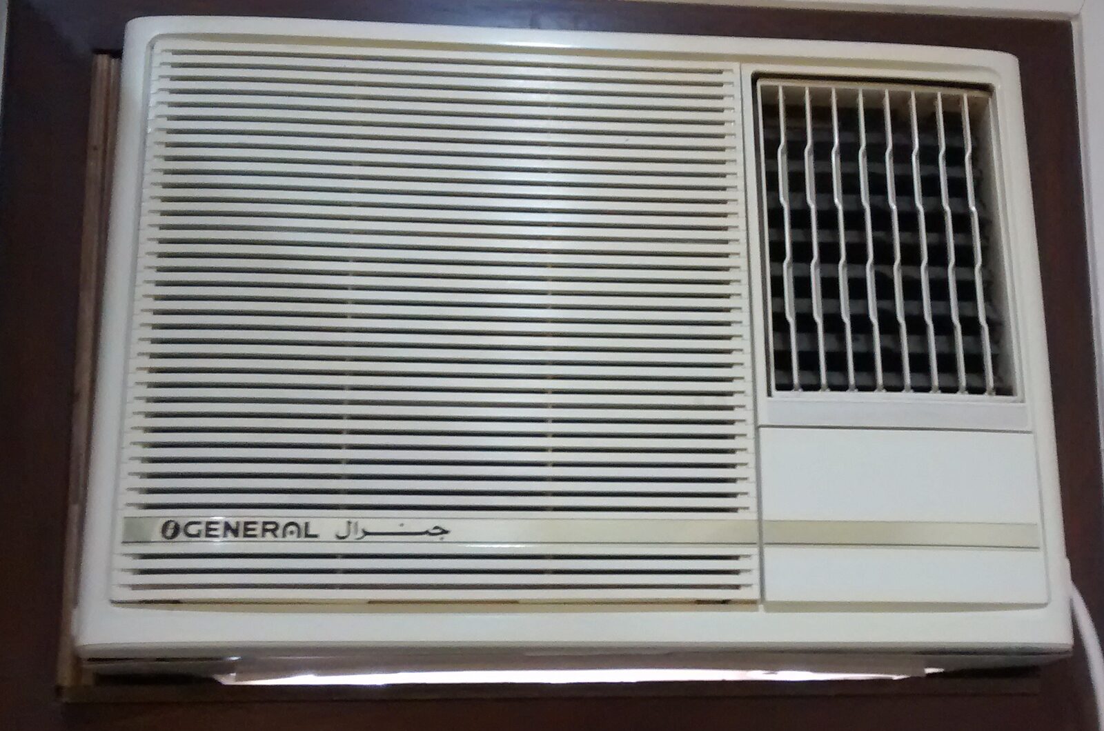 A window air conditioner installed through a wall opening